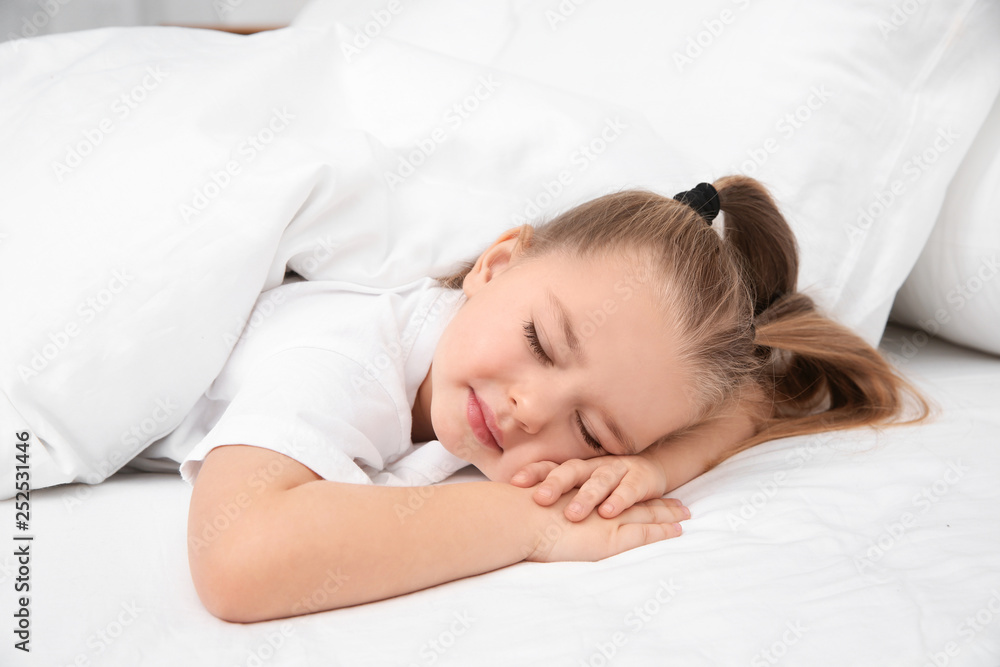 Beautiful little girl sleeping in bed. Bedtime schedule