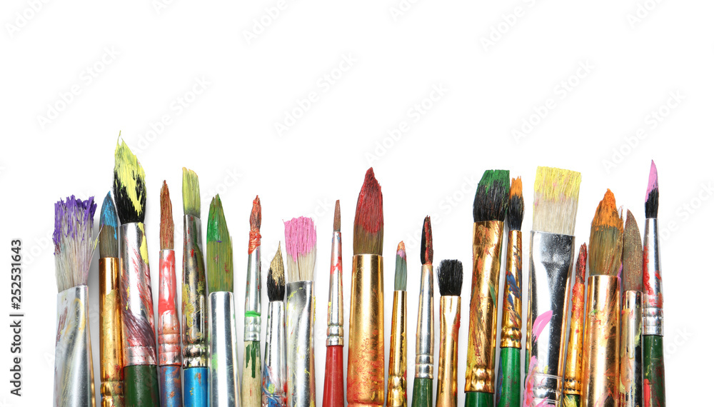 Different paint brushes on white background, top view Different paint brushes on white background, top view