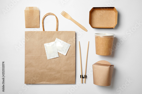 Different containers for mock up design on white background, flat lay. Food delivery service