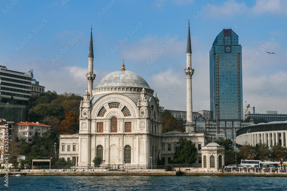 Dolmabahce Mosque and modern skyscraper, Istanbul, Turkey