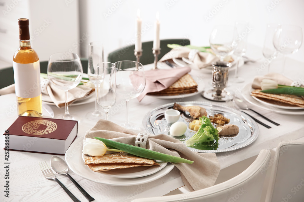 Festive Passover table setting with Torah. Pesach celebration Festive Passover table setting with Torah. Pesach celebration