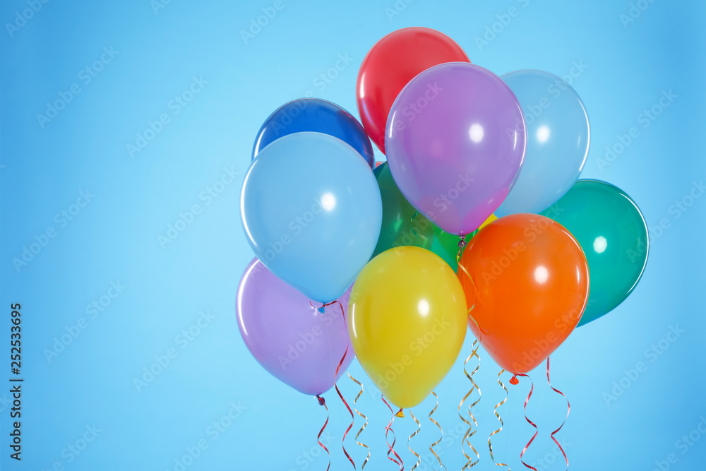 Bunch of bright balloons on color background. Space for text Bunch of bright balloons on color background. Space for text