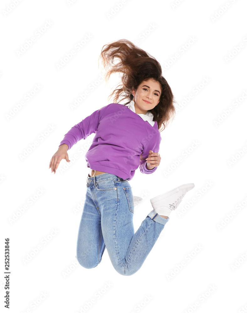 Beautiful young woman in stylish clothes jumping on white background Beautiful young woman in stylish clothes jumping on white background