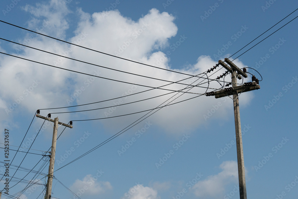 Electrical pole with many cable under blue sky. at Thailand. Electrical pole with many cable under blue sky. at Thailand.