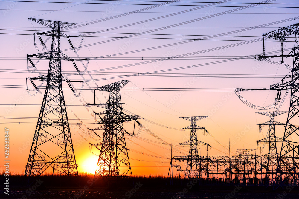 The Contour of Transmission Tower in the Background of Sunset