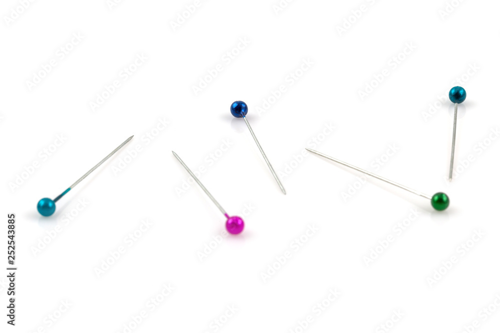 Color sewing push pins isolated on white Color sewing push pins isolated on white