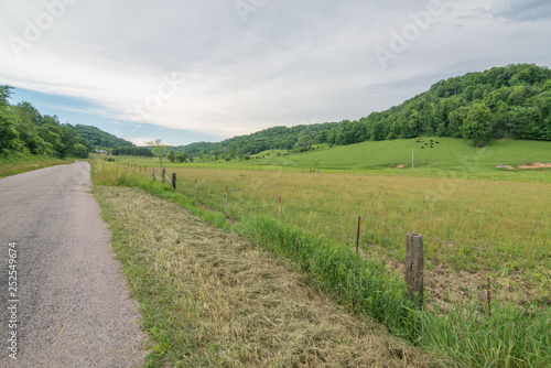 Beautiful rolling hills and rural road of driftless amish area in Western Wisconsin photo