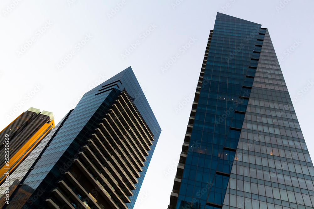 District downtown. View of the beautiful modern high-rise buildings. District downtown. View of the beautiful modern high-rise buildings.