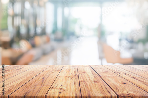 Wood table top on blurred interior reception hotel or modern hallway for background Ready used us display or montage products design © jes2uphoto