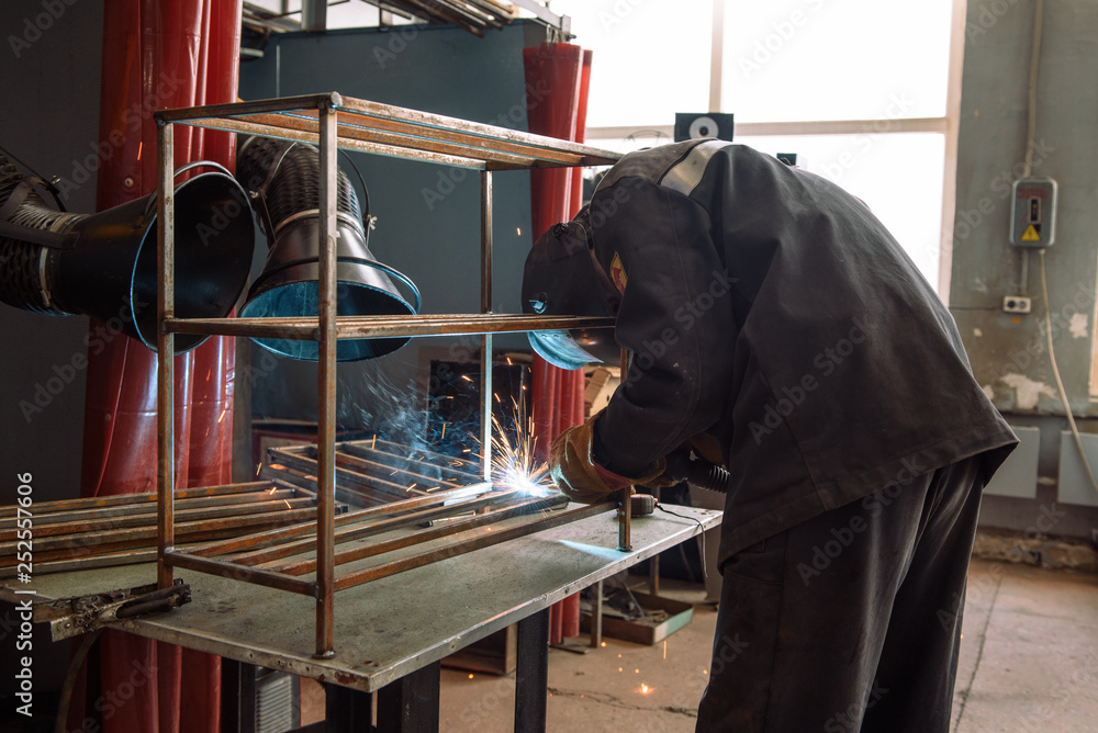 The welder makes the part. Worker welds the details. Master of semi