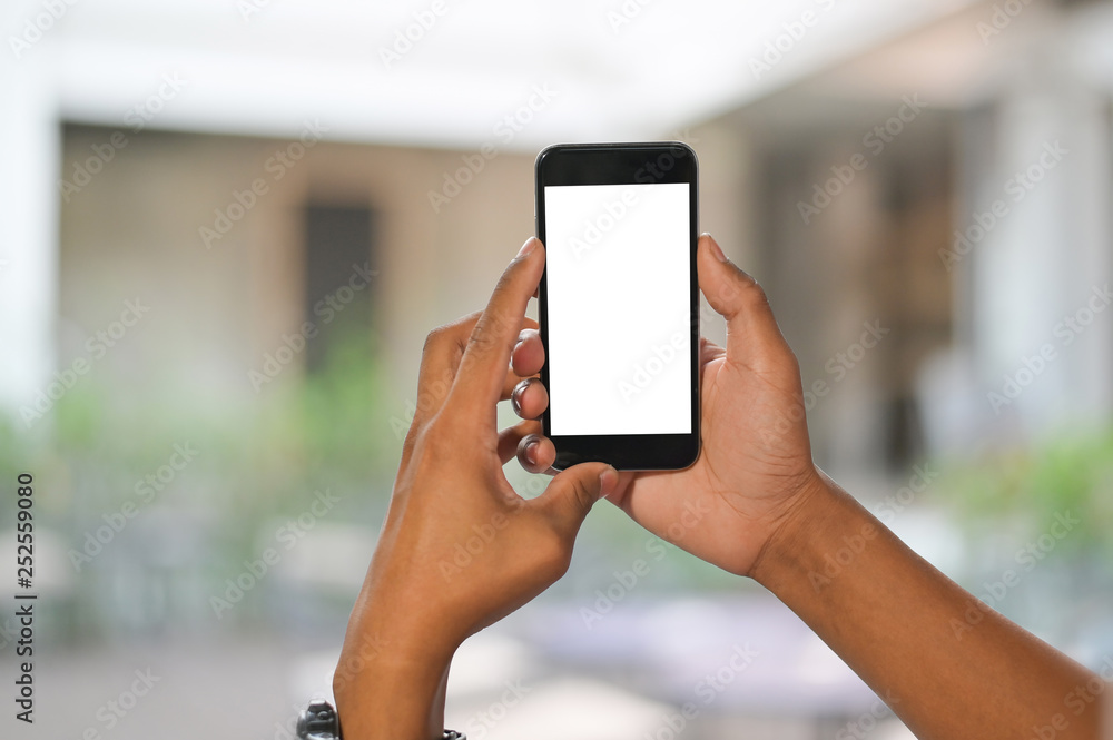 Mockup mobile phone on hands with blur background. Mockup mobile phone on hands with blur background.