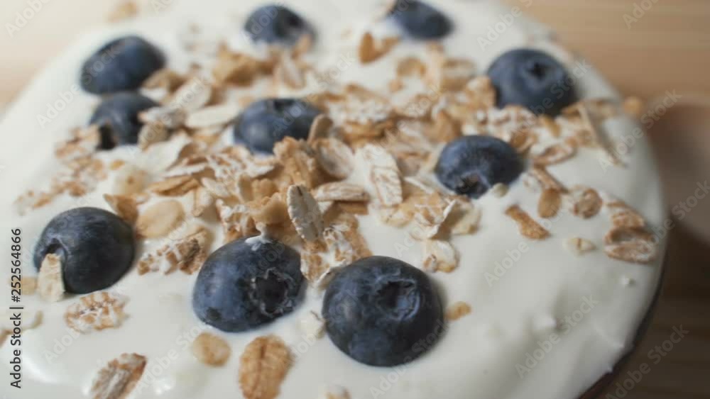 Composition of a typical genuine breakfast made with yogurt, blueberries, muesli. Composition of a typical genuine breakfast made with yogurt, blueberries, muesli.