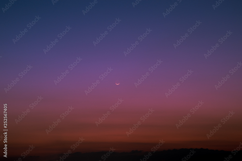the pink sky with moon