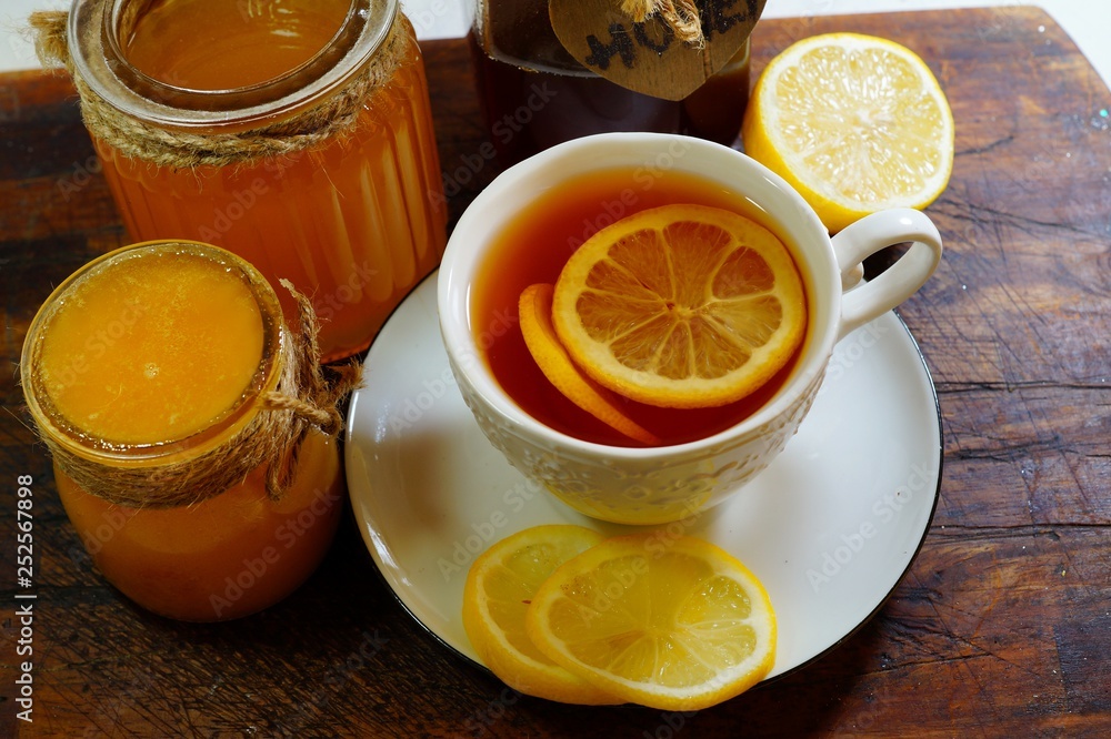 Hot tea with spices, honey and syrup - an alternative to antibiotics - selective focus Hot tea with spices, honey and syrup - an alternative to antibiotics - selective focus