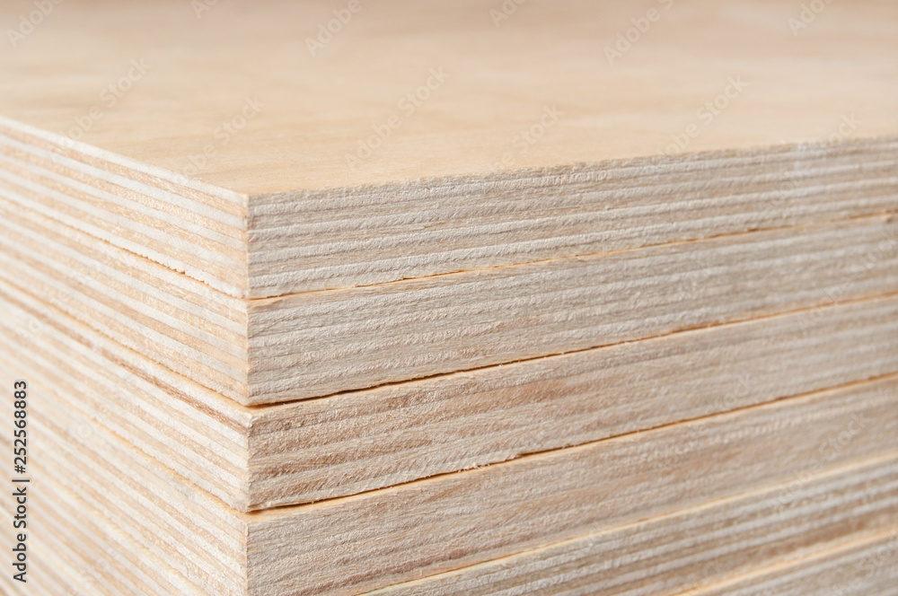 Plywood stacked in a pile. Plywood stacked in a pile.