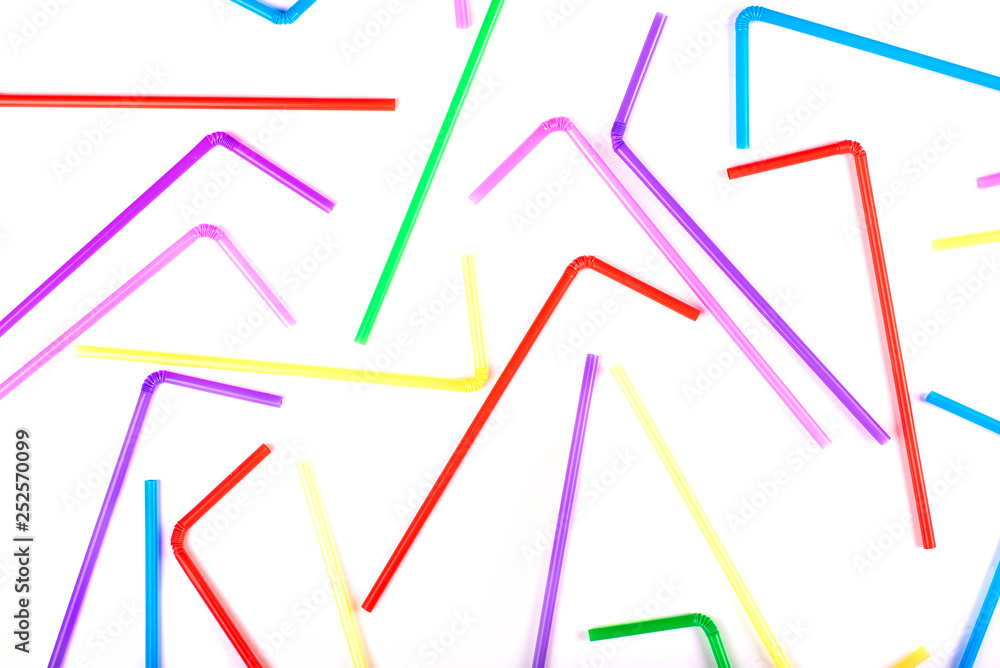 colored straws on a white background colored straws on a white background