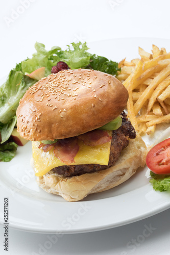 close up view of big fat burger on white background