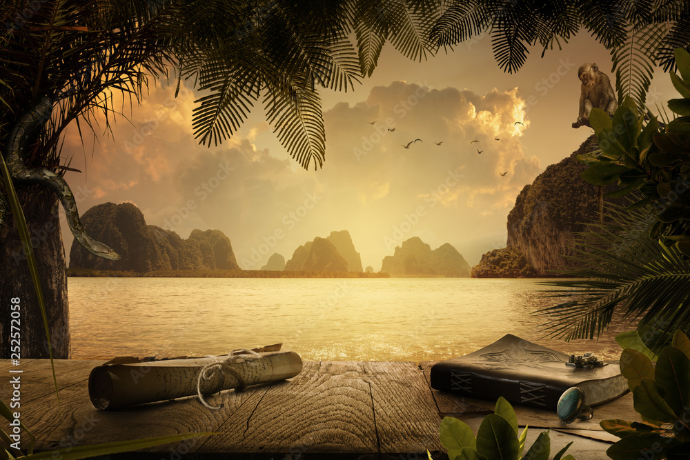 Fototapeta premium zamknąć widok antycznej książki z rocznika papierami i pierścień na wstecznym tropic zachód słońca