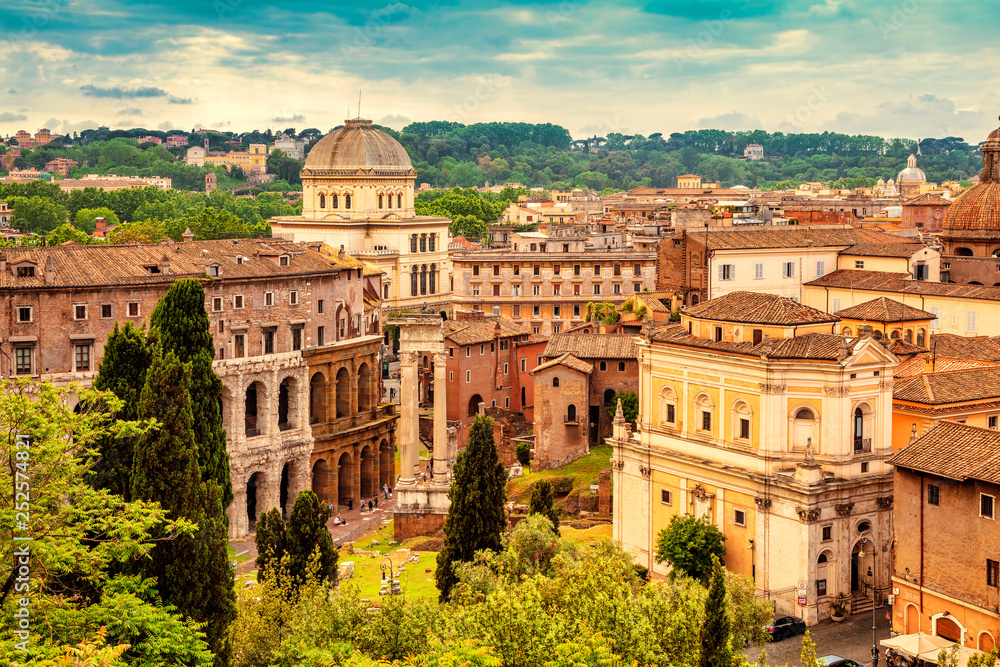 Aerial panoramic cityscape of Rome. Theatre of Marcellus is an ancient open-air theatre in Rome, Italy. Rome architecture and landmark.