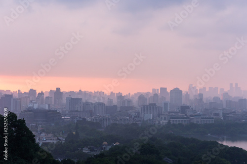panorama of city at sunset © THINK b