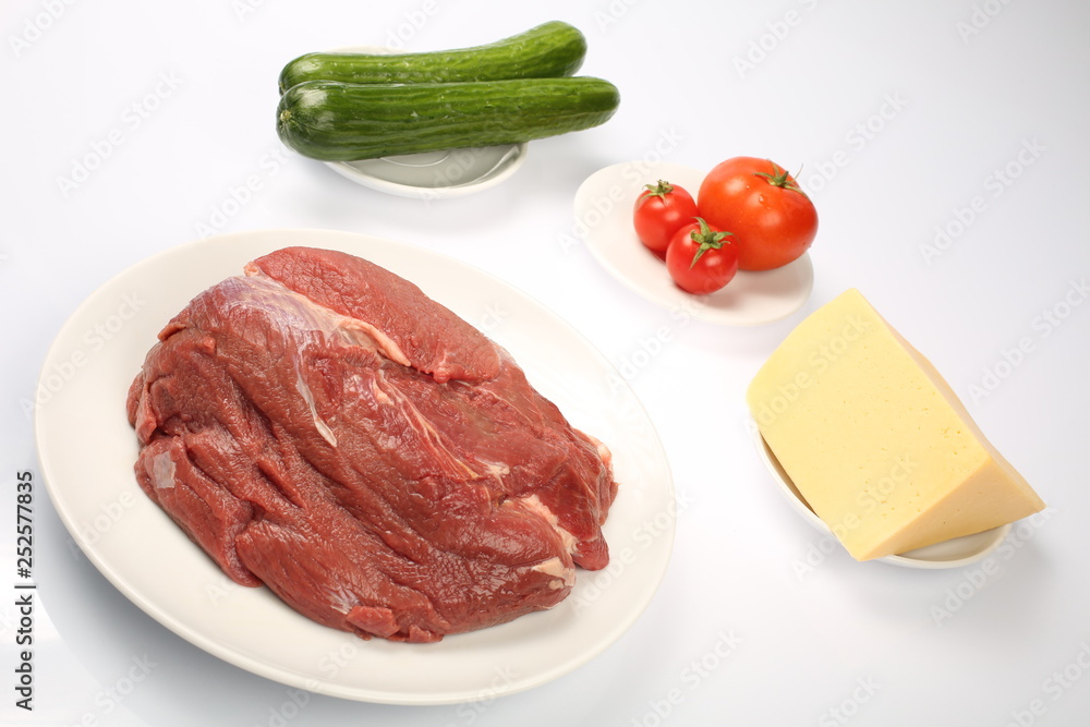 cheeseburger, chicken cutlet, bacon, tomatoes and slices of cheese, dressed with sauce and green salad for a restaurant menu on a white isolated background cheeseburger, chicken cutlet, bacon, tomatoes and slices of cheese, dressed with sauce and green salad for a restaurant menu on a white isolated background