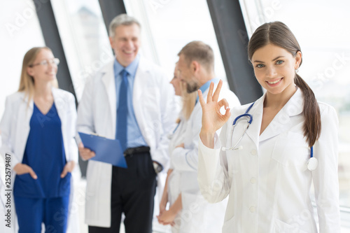 Female doctor showing Ok sign