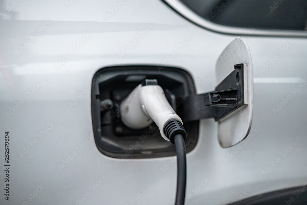 a charging electric car a charging electric car