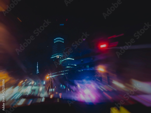 Abstract motion blur effect. The lights of the streets. View from the car