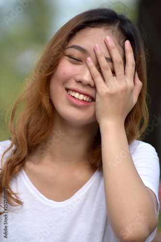 Pretty Asian Adult Female Laughing