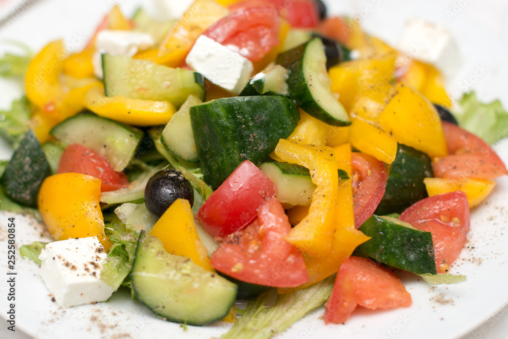 fresh vegetable salad, greek salad on white background. fresh vegetable salad, greek salad on white background.