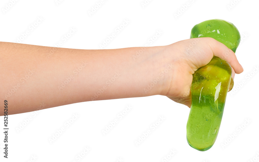 teenager playing green slime with hand, transparent toy