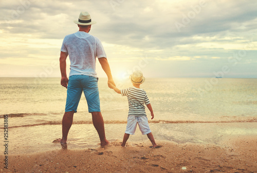 Sticker happy fathers day. family dad and child son at beach.