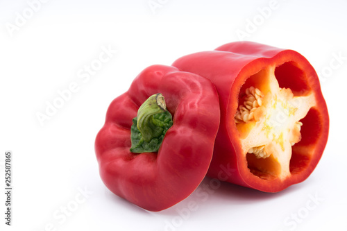 Obraz na plátně Set of sliced  red bell pepper section pieces isolated over white background, vi