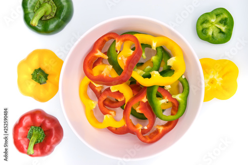 Fotografie Set of sliced  red bell pepper section pieces isolated over white background, vi