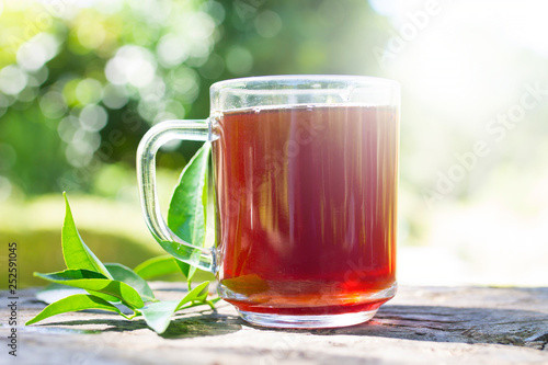 hot red tea cup with lemon