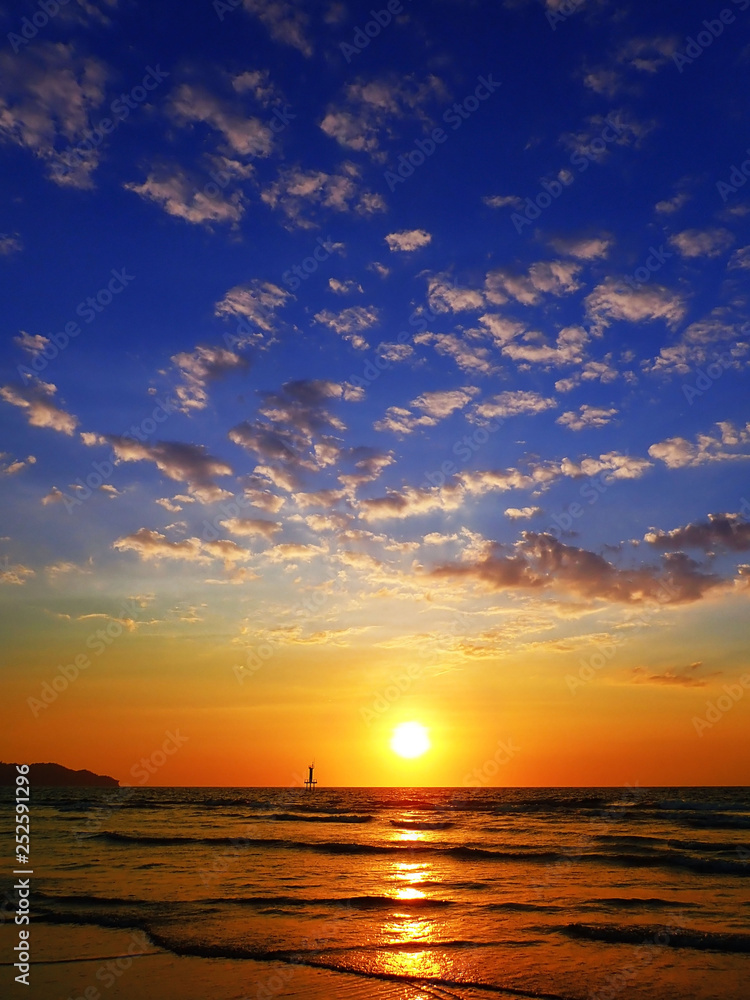 Beautiful sunset view with vivid sky blue on the beach.