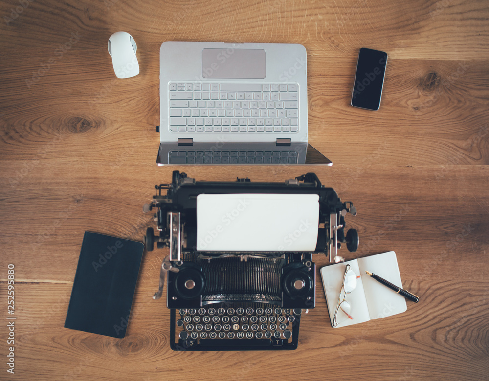 Typewriter vs laptop, old vs new Stock Photo Adobe Stock