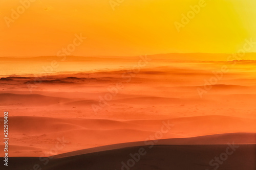 Dunes Beach tele orange sun © Taras Vyshnya