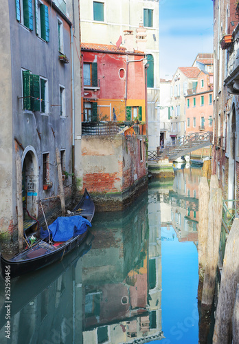 Gondolas In Canal Venice Italy © arkela
