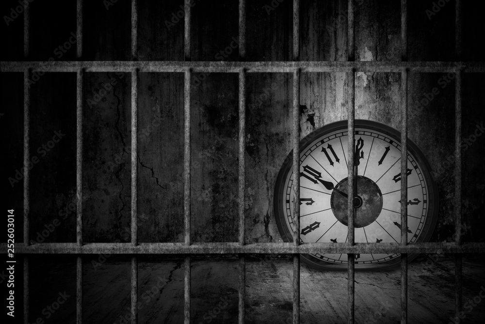 Distorted soft melting clock is imprisoned in old prison rusted metal