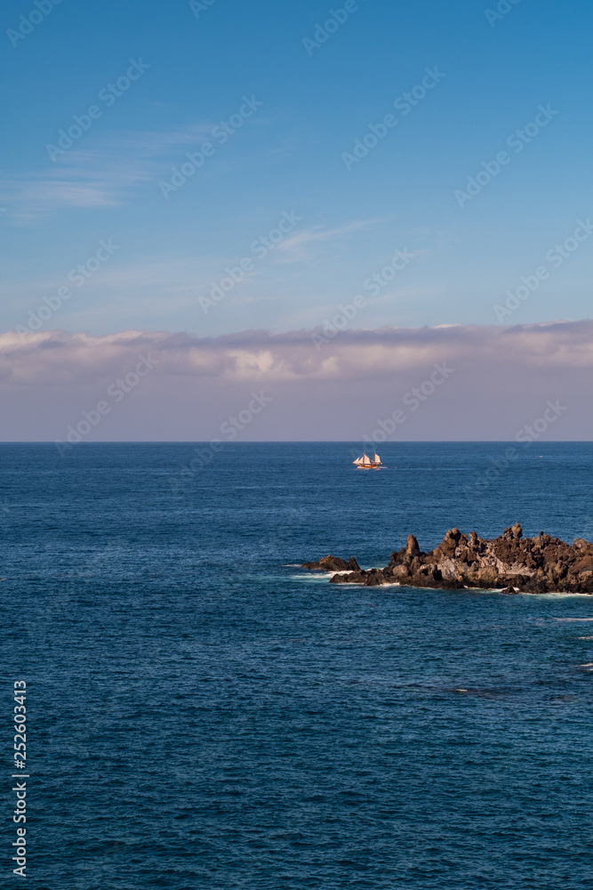 beautiful view on blue ocean water and rocky coast line beautiful view on blue ocean water and rocky coast line