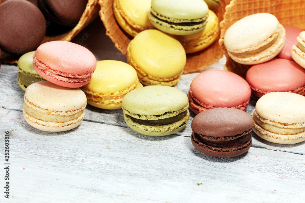 Sweet and colourful french macaroons or macaron on white background Sweet and colourful french macaroons or macaron on white background