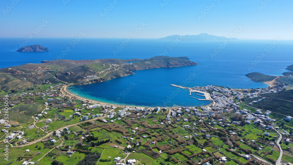 Aerial drone photo of beautiful Livadi beach and main port of Serifos island in spring, Cyclades, Greece