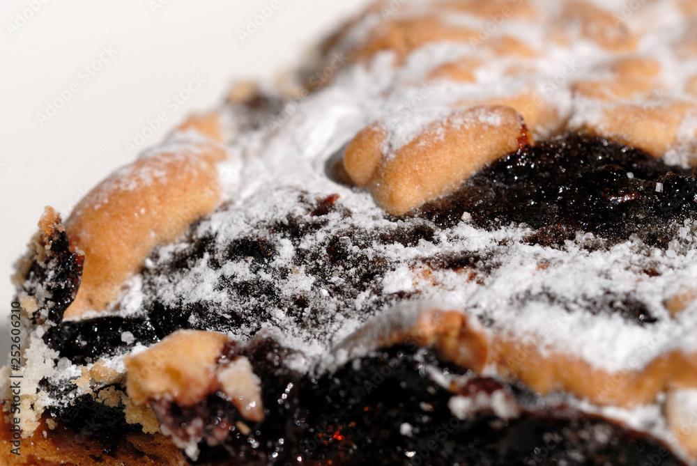 Fototapeta premium Freshly baked sweet powder cake closeup. Shallow depth of field