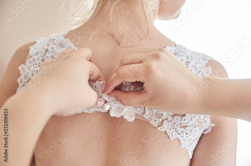 Fastening a wedding dress