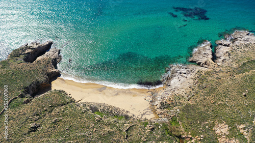 Aerial drone photo of beautiful sandy beach of Kalo Ampeli with deep emerald sea in island of Serifos at spring, Cyclades, Greece