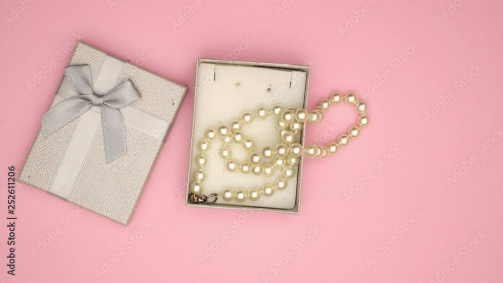 Present box with Pearl necklace - Stop motion animation Present box with Pearl necklace - Stop motion animation