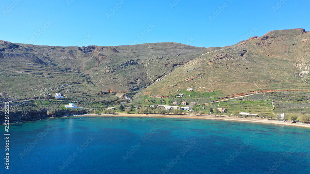 Aerial drone photo of beautiful sandy beach of Ganema with deep emerald sea in island of Serifos at spring, Cyclades, Greece