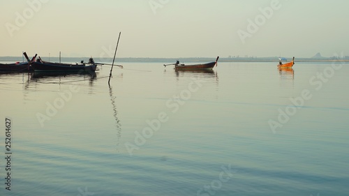 fishing boat on the lake © ATIPPORN