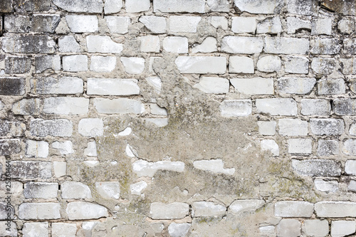 Non professional white brick masonry. Close-up bright vintage brick wall background photo